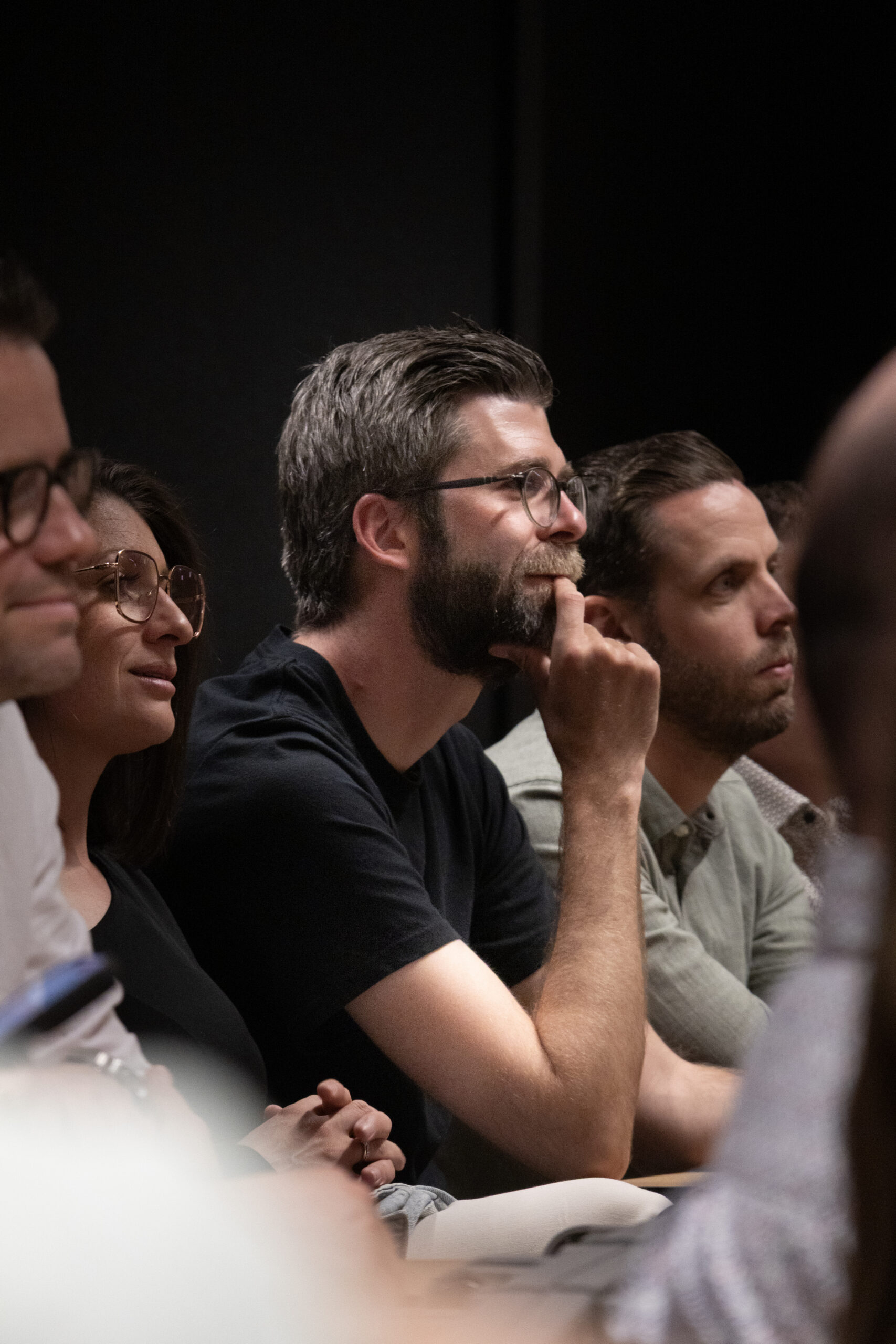 A photo from an event - people listening to a speech