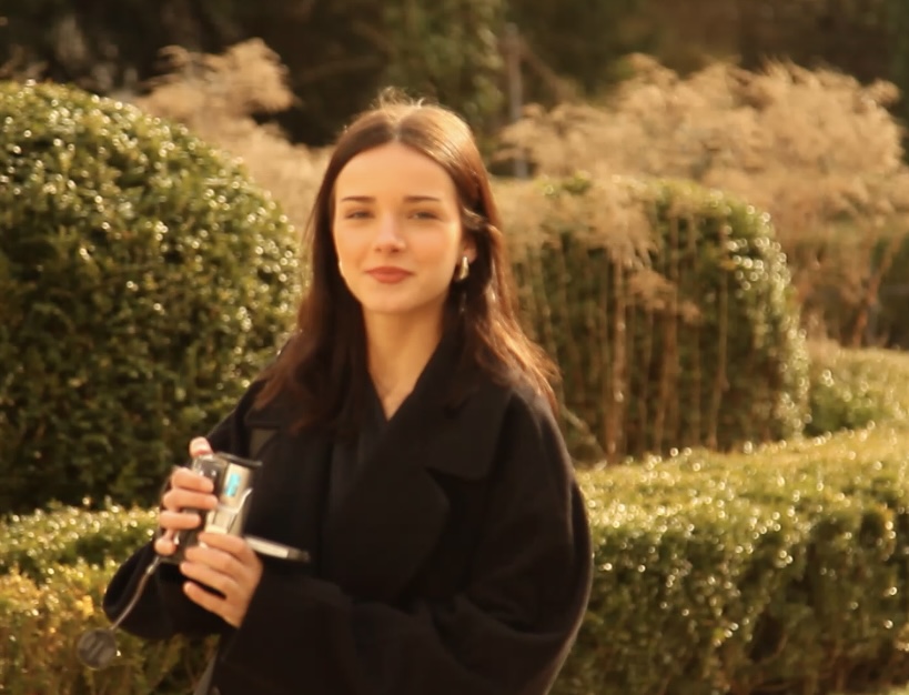 A picture of myself with a camera